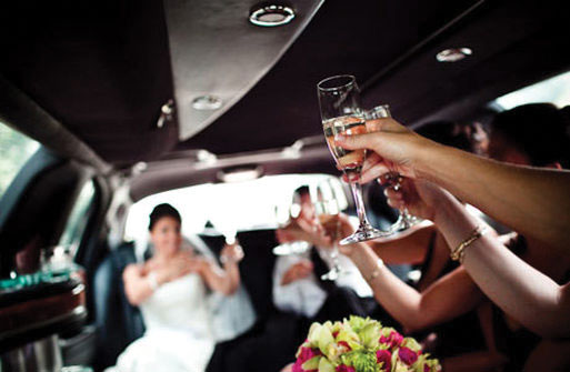 Limousine with passengers from wedding
