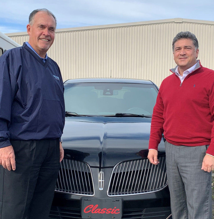 Dolphin Transportation President Timothy Rose (left) and Classic Transportation President Ron Doino